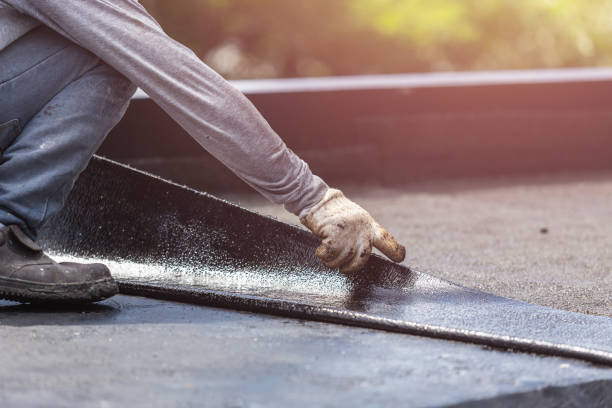 Professional Waterproofing technician working in East Pembroke, NY
